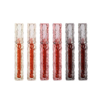 Mandotos long-lasting moisturizing lip gloss with waterproof, mirror finish, showcasing glossy, smooth lips.