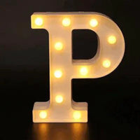 Mandotos luminous letter lights spelling out a word, warm glow, modern decor, ideal for bedroom or living room ambiance.