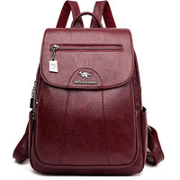 Luxury embossed leather backpack by MANDOTOS featuring elegant stitching and a spacious design, perfect for stylish everyday use.