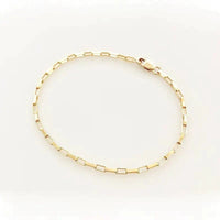 Handcrafted luxury gold chain bracelet by MANDOTOS with intricate link design and polished finish.