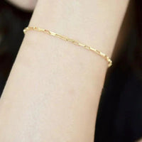 Handcrafted luxury gold chain bracelet by MANDOTOS, featuring intricate links and a polished finish.