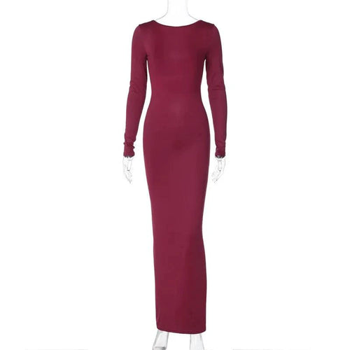 Mandotos chic backless silk dress in soft milk silk, elegant design with a flowing fit and stylish open back.