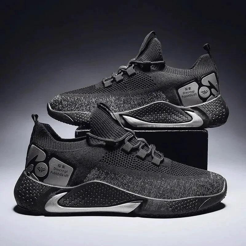 Men's athletic trainer shoes by MANDOTOS, featuring a sporty design with breathable mesh and supportive sole for active wear.