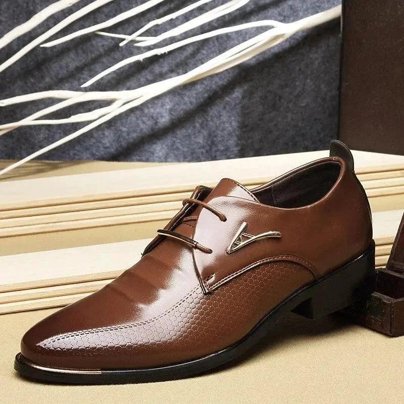 Men's casual leather shoes by MANDOTOS, featuring a sleek design and brown leather material, suitable for everyday wear.