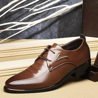 Men's casual leather shoes by MANDOTOS featuring brown leather uppers and comfortable slip-on design.