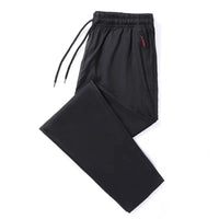 Mandotos men's casual slim fit jogger pants in blue, black, and gray with elastic waist, classic Korean style, plus size available.