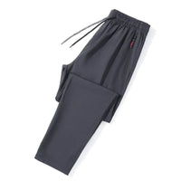 Mandotos men's casual slim fit jogger pants with elastic waist in blue, black, and gray, featuring a classic Korean style.