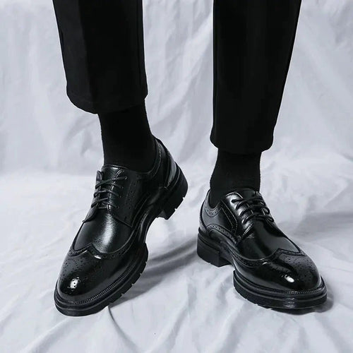 Men's elegant breathable tassel loafers by MANDOTOS, featuring sleek design and comfortable leather material.