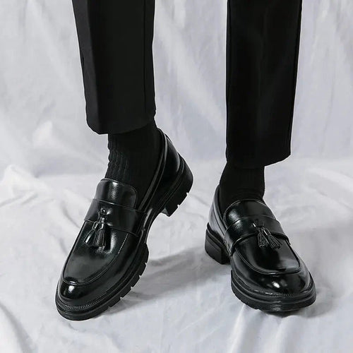 Men's elegant breathable tassel loafers by MANDOTOS, showcasing stylish leather loafers with tassel details on a neutral background.