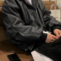 Men's hooded leather jacket by MANDOTOS, featuring a classic design with a hood, front zipper, and stylish black leather.