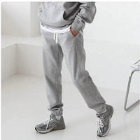Men's hooded sports sweatshirt by MANDOTOS featuring a comfortable fit, casual style, and a front pocket, shown in dark gray.