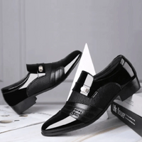 Men's luxury leather loafers by MANDOTOS featuring sleek design and polished finish, perfect for stylish and comfortable dress footwear.