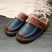 Men's luxury leather slippers by MANDOTOS, showcasing soft leather upper and comfortable slip-on design.