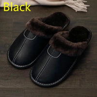 Men's luxury leather slippers by MANDOTOS, featuring soft leather upper and comfortable slip-on design for casual indoor wear.