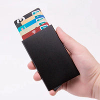 Men's RFID slim carbon fiber money clip and card holder by MANDOTOS, showcasing sleek design and secure card storage.