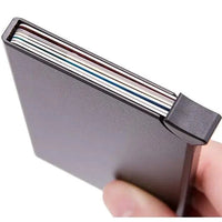Men's RFID slim carbon fiber money clip and card holder by MANDOTOS, compact and lightweight for secure cash and card storage.