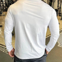 Mandotos men's long sleeve sports fitness shirt, quick-dry badminton and running top for outdoor training and bodybuilding.