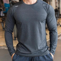 Mandotos men's long sleeve sports fitness shirt, quick-dry outdoor badminton and running top, ideal for training and casual bodybuilding.