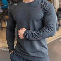 Mandotos men's long sleeve sports fitness shirt for badminton, running, and training, featuring quick-dry, breathable athletic sportswear.