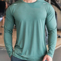 Mandotos men's long sleeve sports fitness shirt, quick-dry badminton and running top, ideal for outdoor training and bodybuilding.