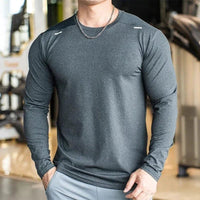 Mandotos men's long sleeve sports fitness shirt, quick-dry badminton and running top for outdoor training and bodybuilding.