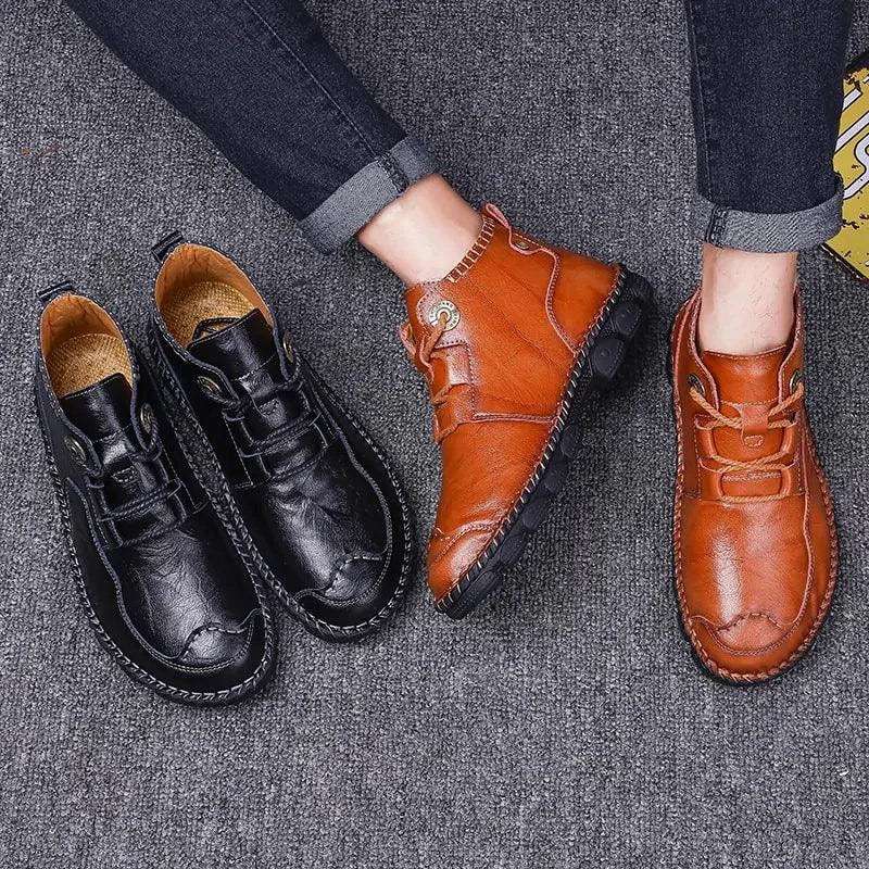 Men's stylish ankle boots by MANDOTOS featuring sleek design and durable leather, perfect for casual or smart occasions.