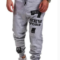 Men's joggers from MANDOTOS featuring comfortable fabric and modern fit, shown in a casual pose against a neutral background.
