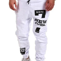 Mandotos men's joggers in black, made from comfortable fabric, featuring a relaxed fit and elastic waistband.