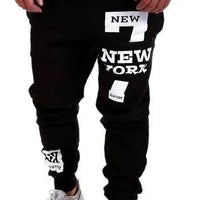 Mandotos men's joggers in black, featuring a relaxed fit, elastic waistband, and side pockets for casual comfort.