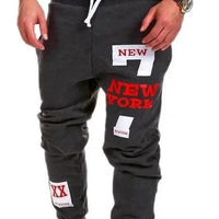 Mandotos men's joggers in black, featuring elastic waistband and tapered fit, suitable for casual and athletic wear.