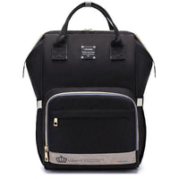 Mandotos Mummy Maternity Bag with multiple compartments, beige fabric, and sturdy handles for stylish pregnancy and postpartum use.