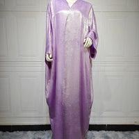 Mandotos Muslim robe abaya in black with flowing fabric and elegant design, full-length traditional Islamic dress.