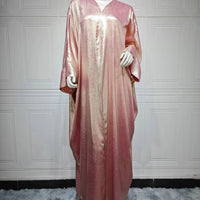 Mandotos Muslim robe abaya in black with intricate embroidery, flowing fabric, traditional modest dress for women.