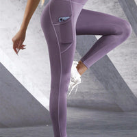 Mandotos high waist women's yoga leggings with pockets, stretch fit, solid color, suitable for fitness, running, and sports activities.