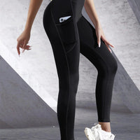 Mandotos high waist women's yoga leggings with pockets, stretch fabric, solid color, ideal for fitness, running, and sports activities.