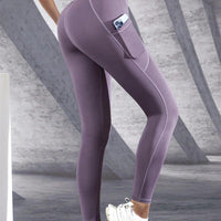 Mandotos high waist women's yoga leggings with pockets, stretch fabric, push-up design, suitable for fitness and running.