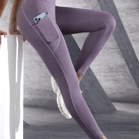 Mandotos high waist women's yoga leggings with pockets, stretch fabric, solid color, suitable for fitness, running, and sports.
