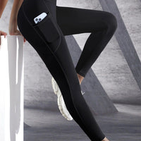 Mandotos high waist women's yoga leggings with pockets, stretchy solid color fitness tights for running and workout activities.