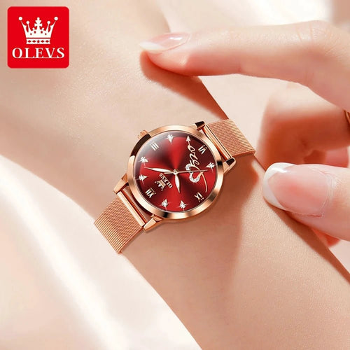 Mandotos OLEVS luxury women's quartz watch with rose gold finish, stainless steel mesh strap, and love-themed dial.