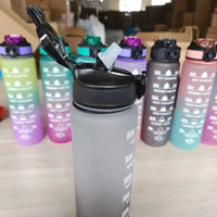 Mandotos PeakHydrate motivational water bottle with inspirational design and leak-proof lid, perfect for staying hydrated on the go.
