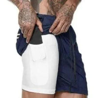 Mandotos Pocket Compression Shorts shown in black with side pockets, designed for athletic support and comfort.