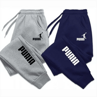 Mandotos PUAIA print men's sport jogging trousers in solid color, loose fit for autumn and winter, casual streetwear pants.