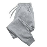 Mandotos PUAIA print men's jogger pants in solid color, suitable for autumn/winter, sporty, loose fit streetwear trousers.