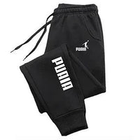 Mandotos PUAIA print men's sport jogging pants in solid color, loose fit, suitable for autumn/winter outdoor fitness and streetwear.