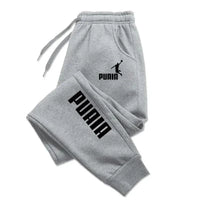Mandotos PUAIA Print men's sporty jogging pants in solid color, loose fit, suitable for autumn and winter streetwear.