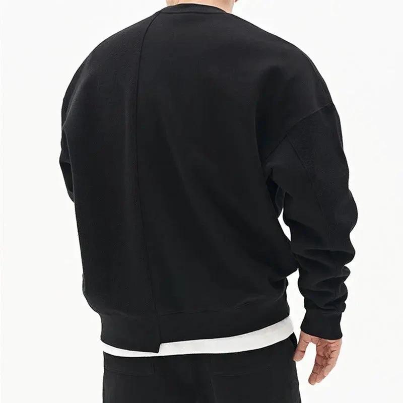 Loose men's pullover round neck sweater by MANDOTOS, showcasing a cozy fit and classic style in neutral fabric.