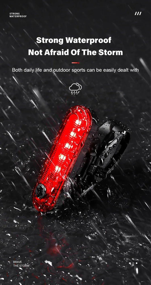 MANDOTOS rear bike tail light with USB recharge, bright red LED, easy to install for cycling safety on bicycles.