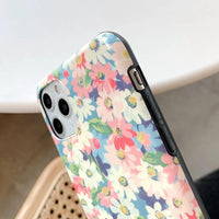 Mandotos retro daisy phone case with colorful floral design for iPhone and Android devices.