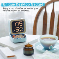 Mandotos retro pixel art Bluetooth speaker and alarm clock with colorful pixel design and digital display.