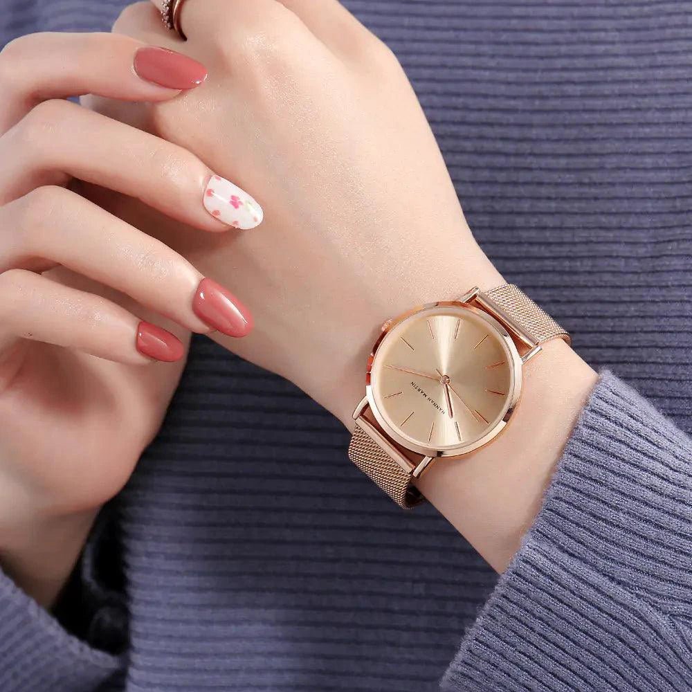 Rose gold stainless steel ladies' watch by MANDOTOS with a sleek round face and elegant band, showcasing a stylish timepiece.